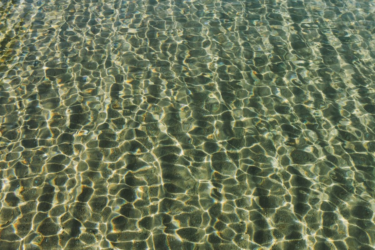 crystal clear waters of Akti Oneirou