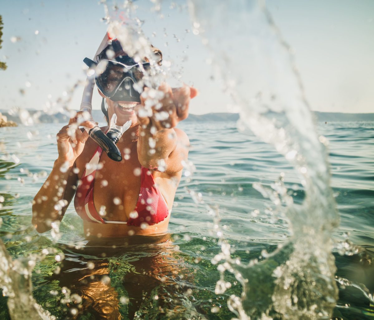 Woman snorkeling and having fun in Halkidiki